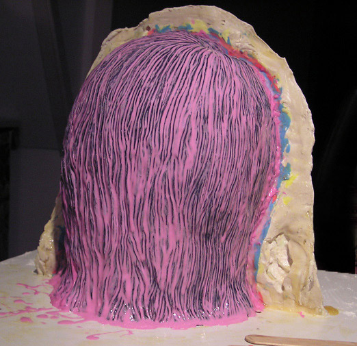 the process of three layers of rubber repeats itself on the other side of the portrait
